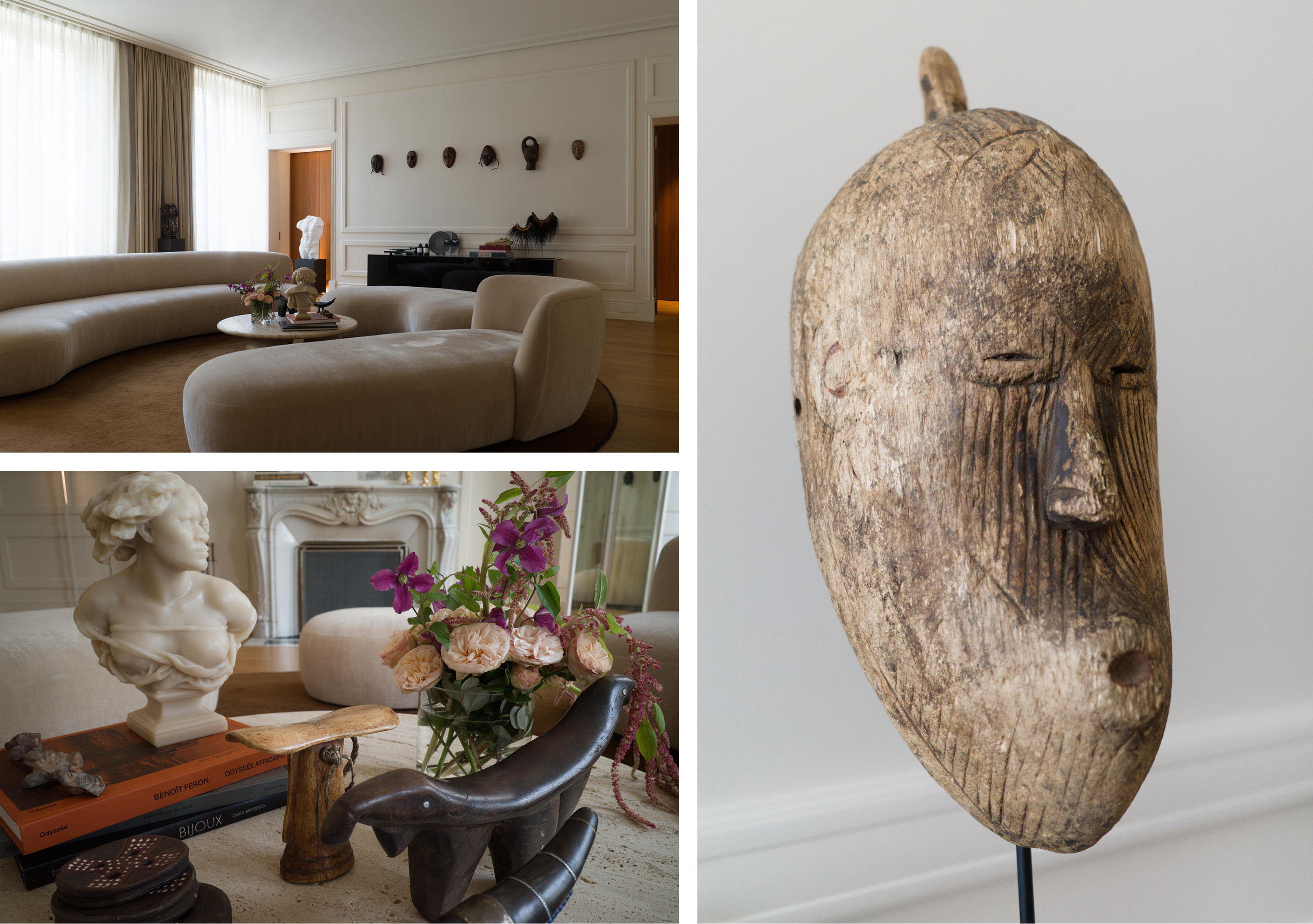 Living room with curved sofas, African masks, flowers, and a close-up of a carved wooden mask.