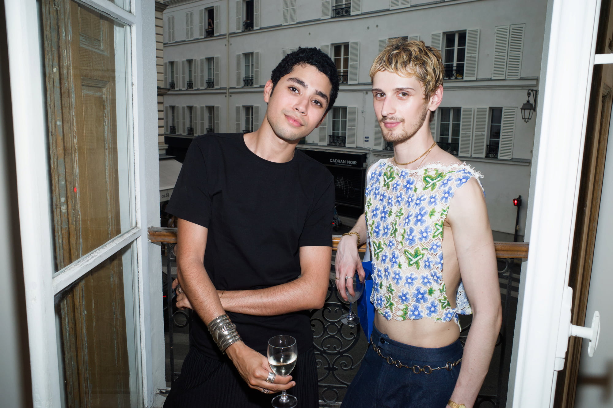 Saad Ahellal and Anselin Louis posing beside an open window during Arty House in Paris