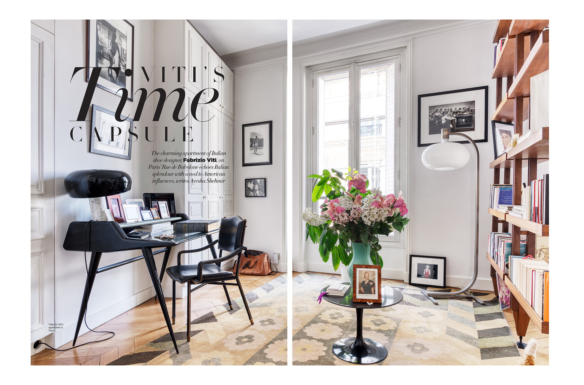 Living room in Fabrizio Viti’s Paris apartment with a writing desk, framed photographs, flowers, bookshelves, and patterned rug